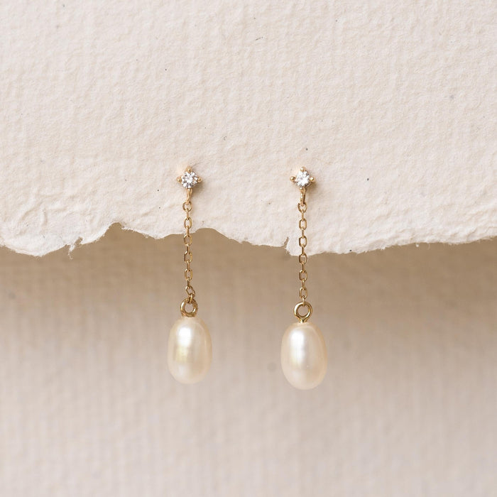 Freshwater pearl drop earrings with white sapphire in 14k yellow gold