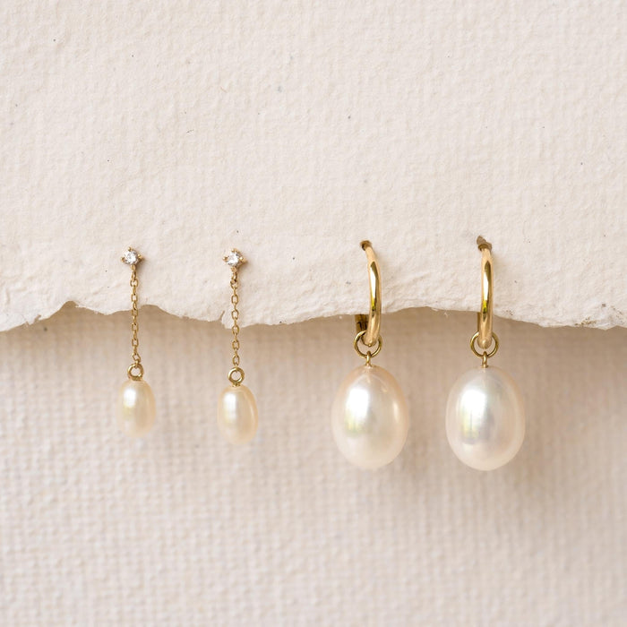 Oval pearl drop earrings in yellow gold