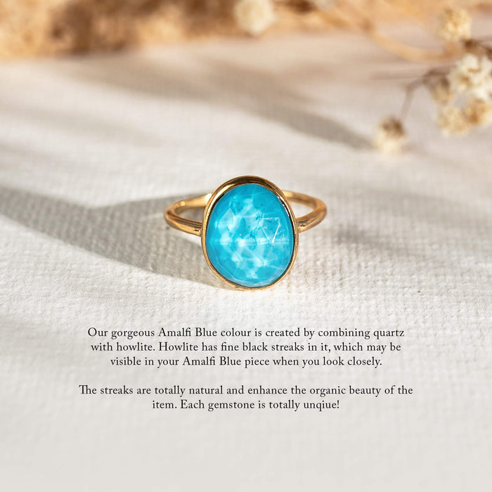 Blue quartz and howlite round gemstone on gold band