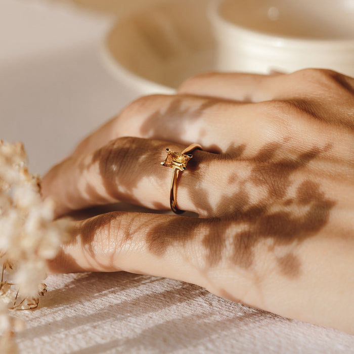 Citrine gemstone ring in baguette cut on gold band