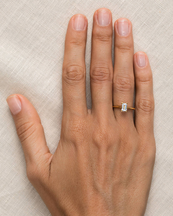 Gold vermeil white topaz baguette gemstone ring on hand