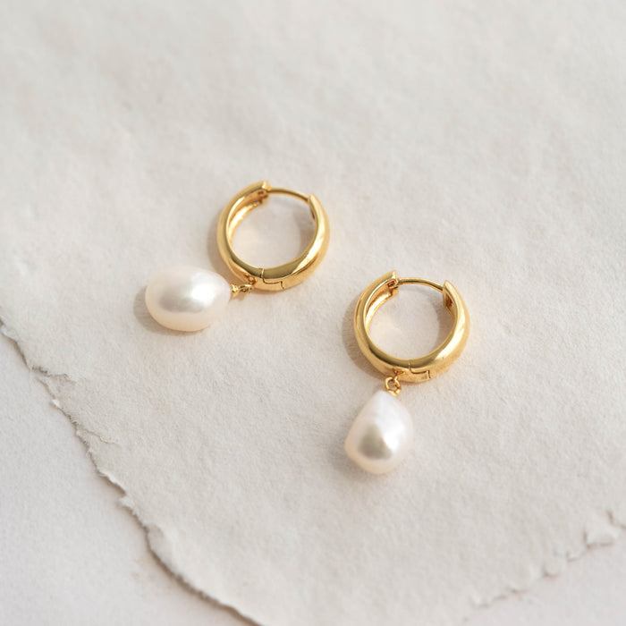 Baroque Pearl Chunky Hoop Earrings - Meredith featuring gold vermeil hoops with dangling freshwater baroque pearls on a neutral background