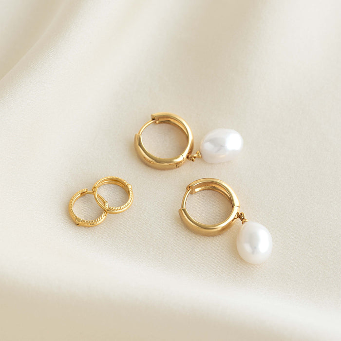 Baroque Pearl Chunky Hoop Earrings - Meredith featuring gold vermeil hoops with freshwater baroque pearl drops on cream fabric background
