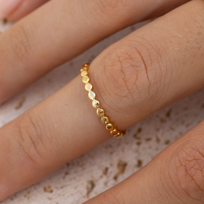 Stacking beaded ring in gold vermeil on model