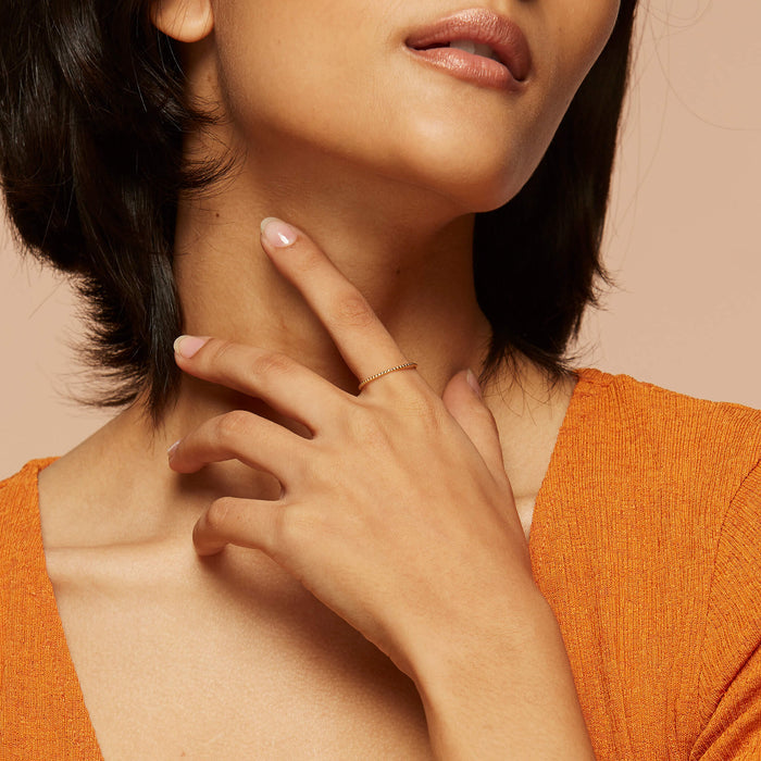 Thin stacking ring with beaded design in gold vermeil
