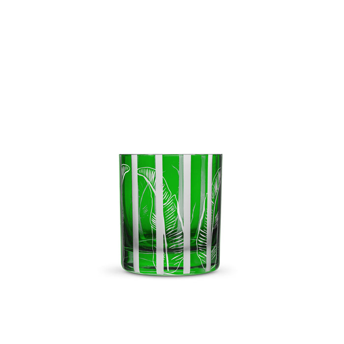 A green crystal tumbler with a detailed banana leaf design.