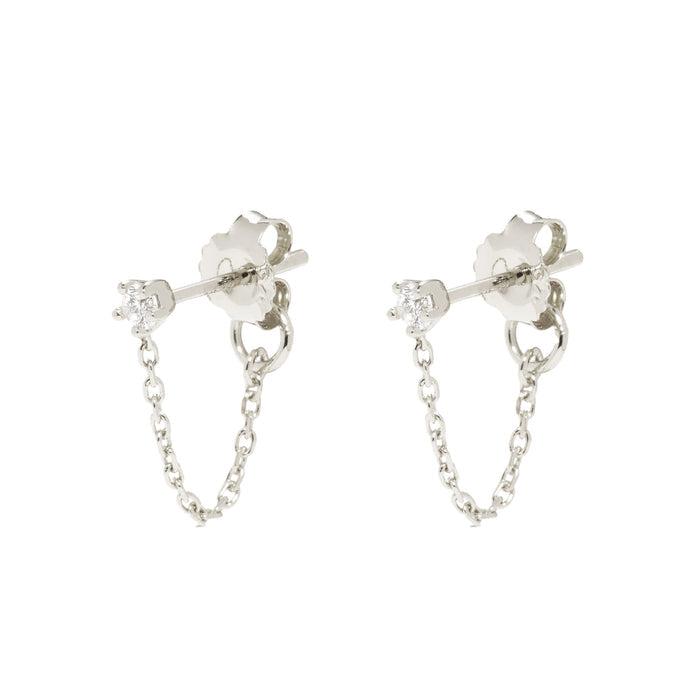 Close-up of Chain Earrings Silver - Ella featuring sterling silver chain loops with small round cubic zirconia studs on white background