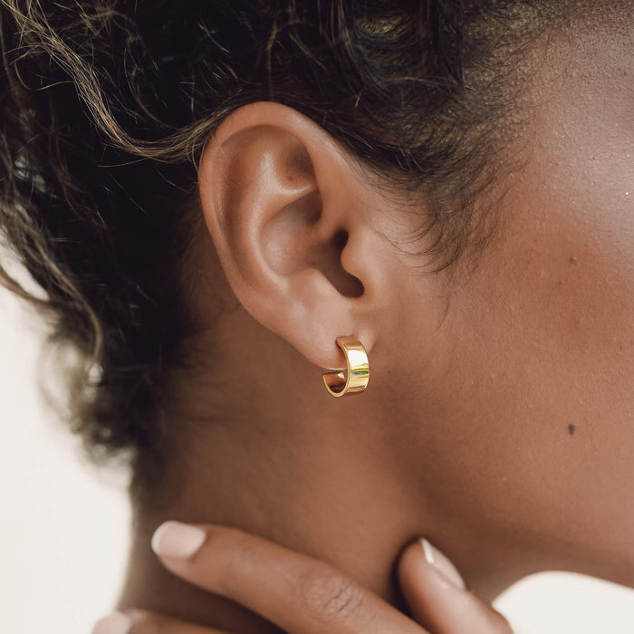 Gold vermeil thick gold hoop earrings in a C-shape