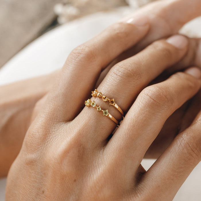 Two irregular gemstone rings with citrine and peridot in gold vermeil