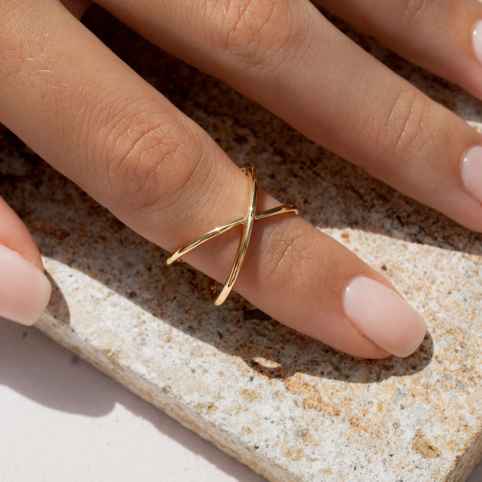Gold vermeil criss cross ring on woman