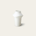 Curve table light lighting by Fable Home, shown in a translucent finish. – #translucent