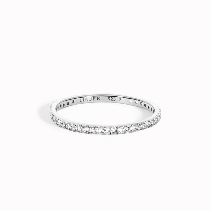 White topaz eternity ring set in sterling silver