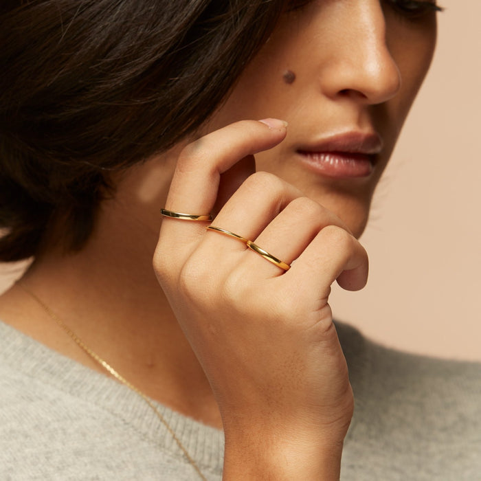 Gold vermeil thin stacking rings on model