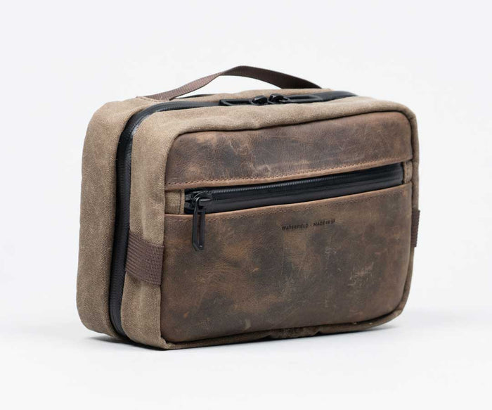 Stylish full-grain leather with waxed canvas