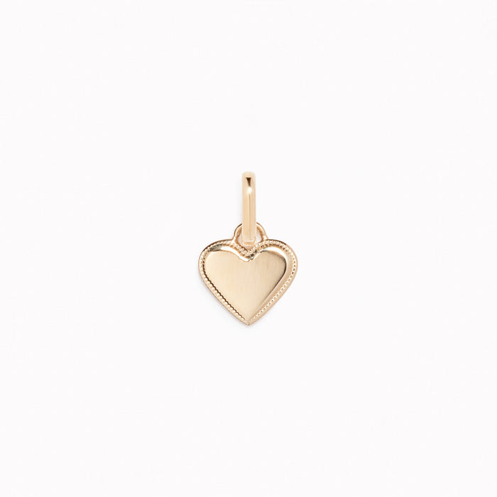 Heart Charm 14k Gold pendant with delicate beaded border displayed on a white background
