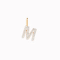 Diamond Initial Pendant 14k Gold - M with sparkling diamonds on a white background for layering on necklaces