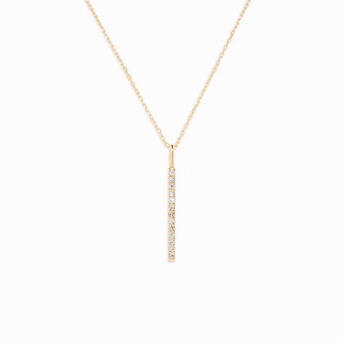 Diamond Line Pendant 14k Gold featuring a vertical bar pendant with 13 sparkling diamonds on a delicate gold chain
