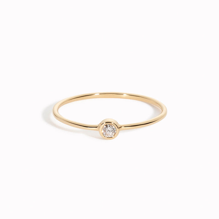 Bezel-set lab grown diamond ring in 14k yellow gold