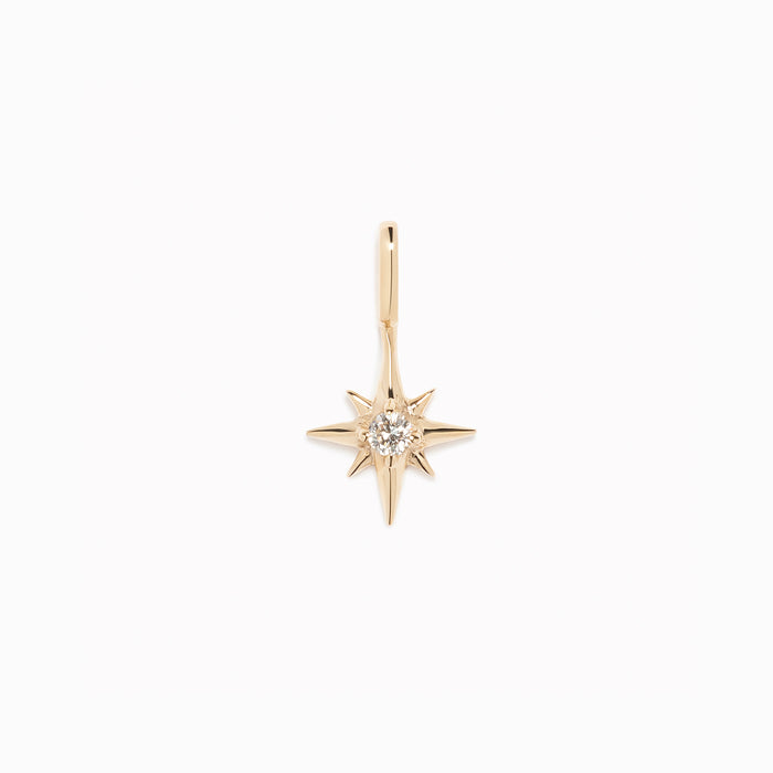 Diamond Star Charm 14k Gold pendant featuring a round-cut diamond set in polished 14k yellow gold