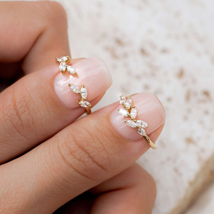 Two cubic zirconia leaf rings in gold vermeil