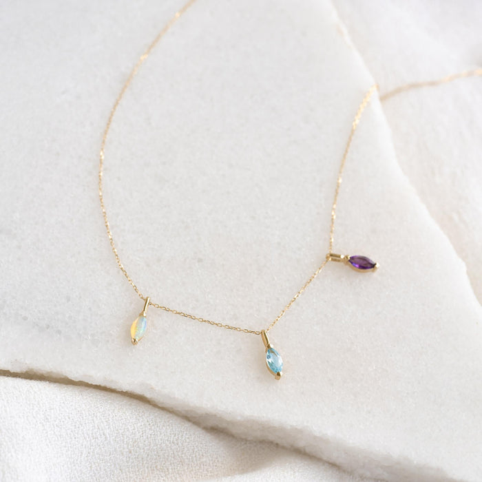 March Birthstone Pendant 14k Gold - Swiss Blue Topaz and complementary gemstones on delicate gold chain