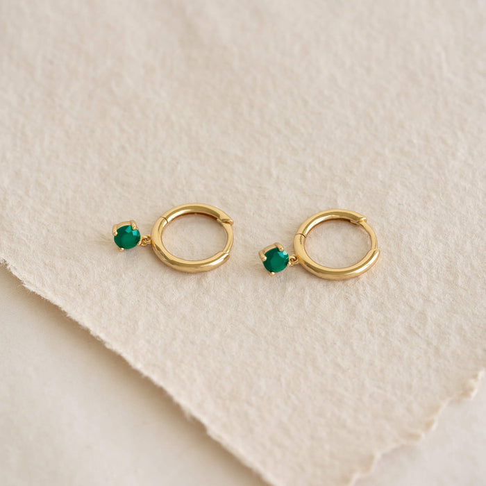 May Birthstone Drop Huggie Earrings - Green Chalcedony with gold vermeil setting on textured beige background