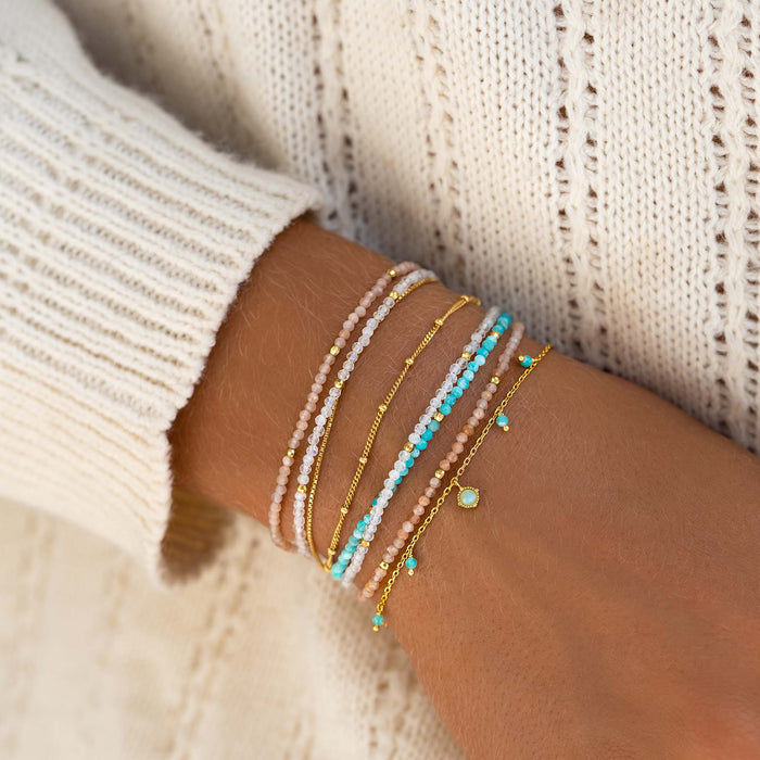 Stack of beaded bracelets
