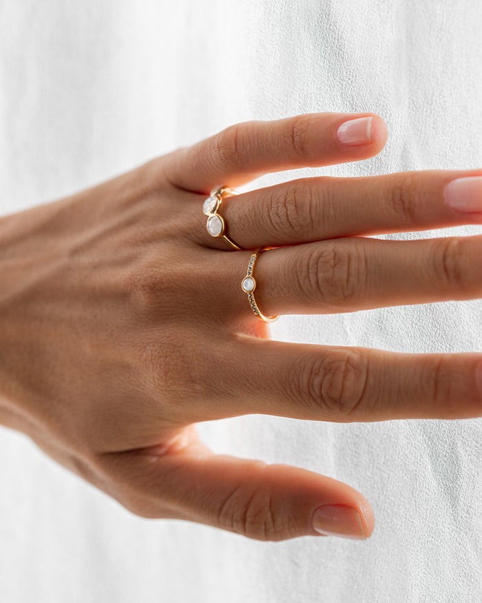 Two rings made with moonstones and mother of pearl in gold vermeil