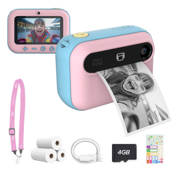 myFirst Insta 20 pink and blue kids instant print camera showing front and back views, printing a photo, along with accessories including a lanyard, thermal paper rolls, charging cable, 4GB SD card, and stickers.