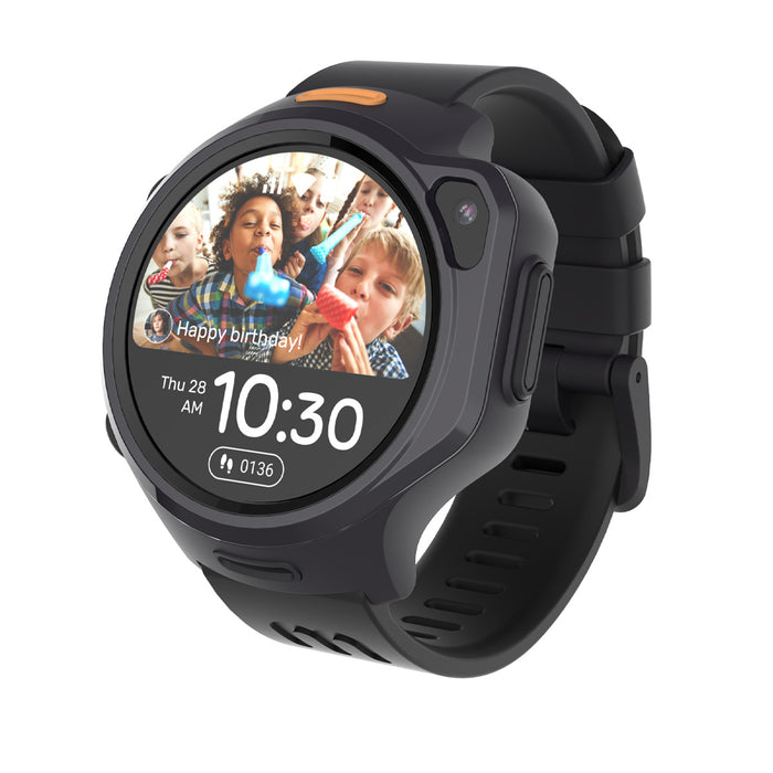 myFirst Fone R2 black kids smartwatch displaying a birthday photo watch face with time and a "Happy birthday!" message.
