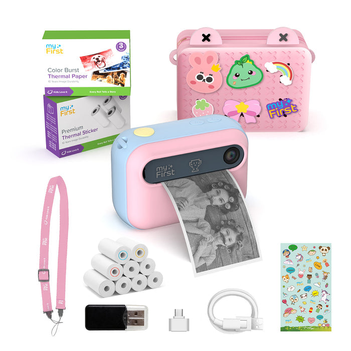 myFirst Insta 20 pink and blue kids instant print camera bundle with carrying bag, thermal paper rolls, lanyard, charging accessories, and sticker sheet.
