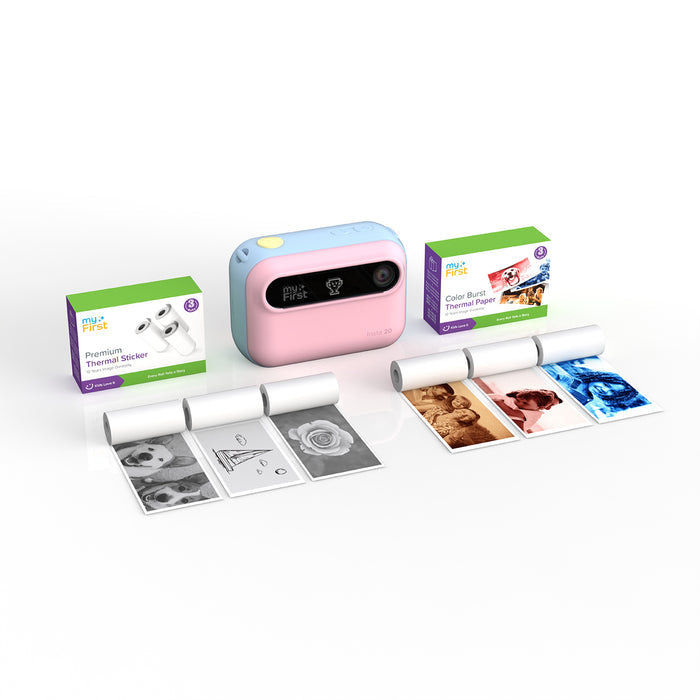 myFirst Insta 20 pink and blue instant print camera displayed with Premium Thermal Sticker and Color Burst Thermal Paper rolls, showing both black-and-white sticker prints and color photo samples.