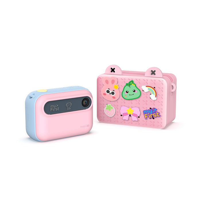 myFirst Insta 20 pink and blue kids instant print camera displayed with its matching pink carrying bag decorated with colorful cartoon stickers.