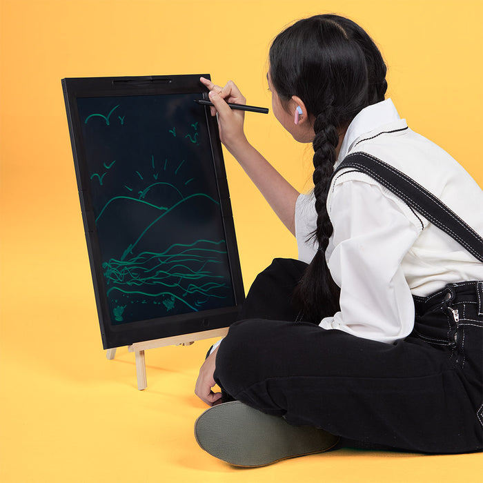 Child drawing on large 21-inch LCD writing board for kids with stylus and easel stand