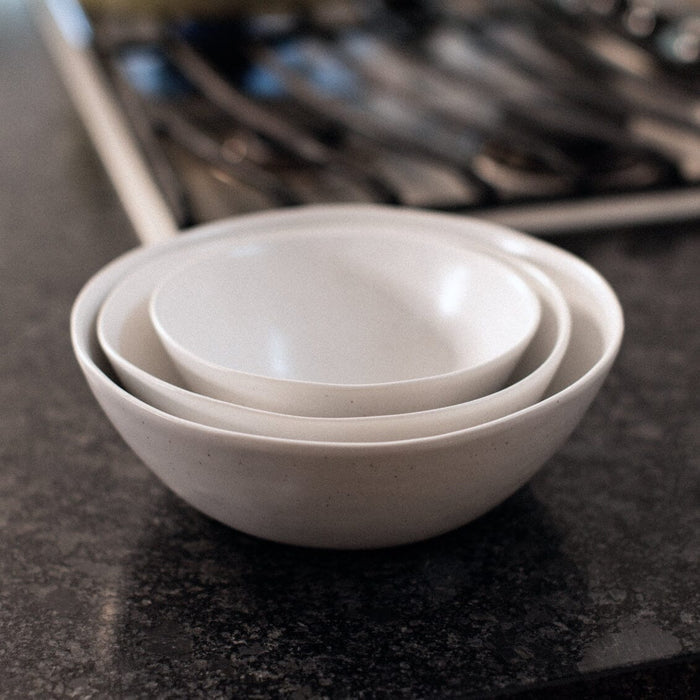 Nested serving bowls dinnerware by Fable Home, shown in a speckledwhite finish. – #speckledwhite