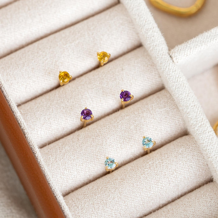 November Birthstone Stud Earrings 14k Gold - Citrine displayed with amethyst and aquamarine studs in a jewelry box