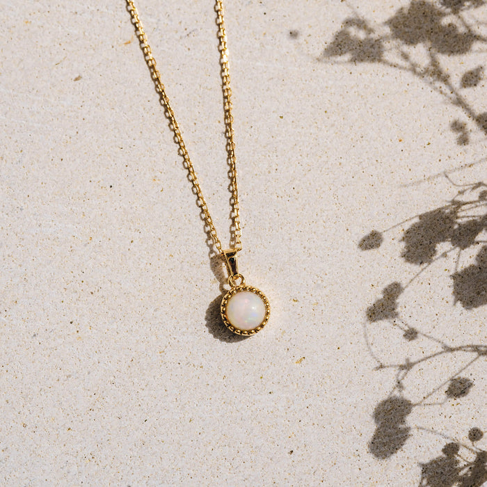 Dainty gold chain necklace with opal birthstone pendant
