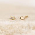 Opal and diamond stud earrings in 14k yellow gold