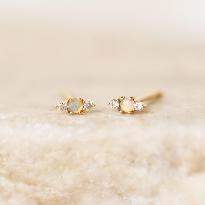 Opal and diamond stud earrings in 14k yellow gold