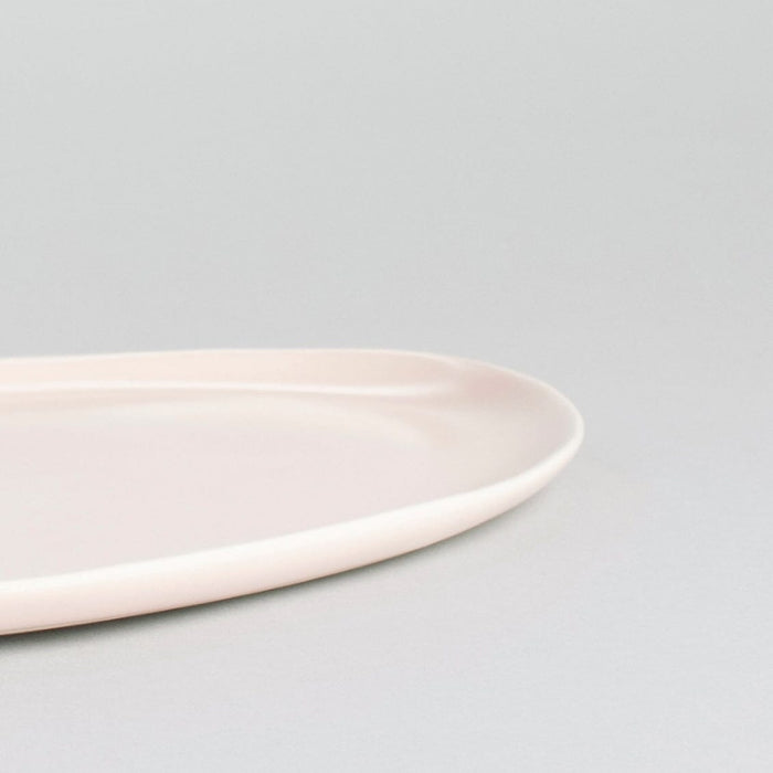 Oval serving platter dinnerware by Fable Home, shown in a blushpink finish. – #blushpink