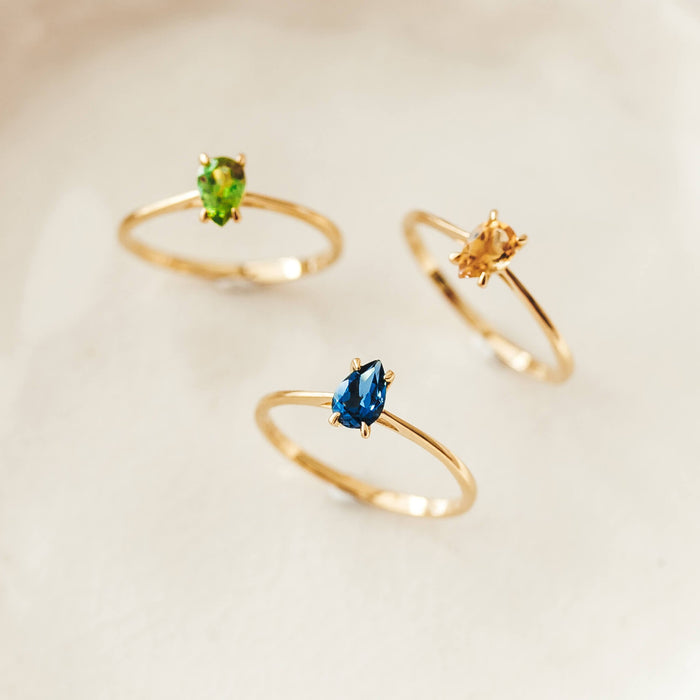 3 gemstone pear shaped solitaire ring in multiple colors