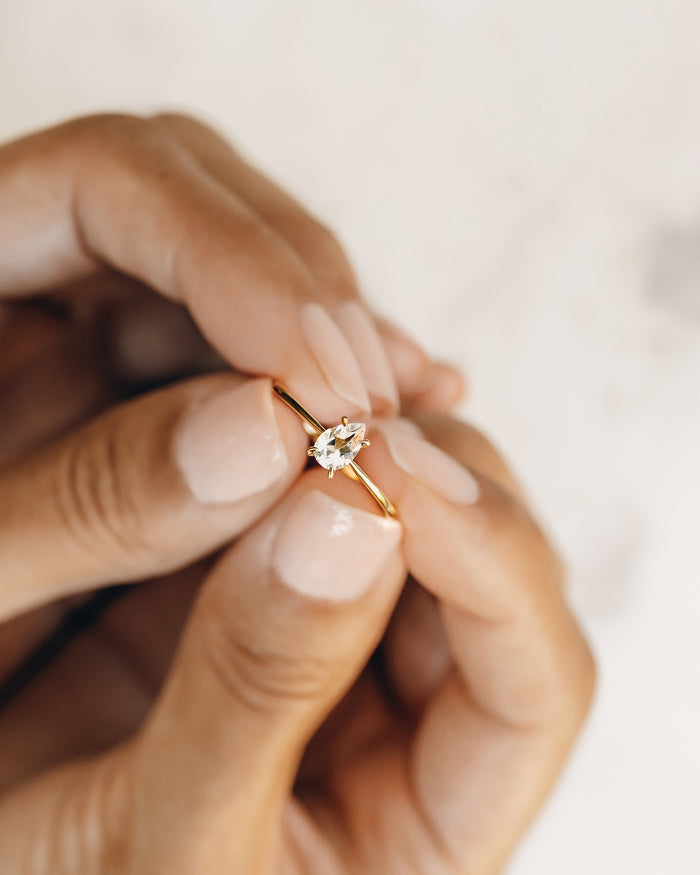 Gemstone ring with pear shaped white topaz gemstone on gold vermeil band