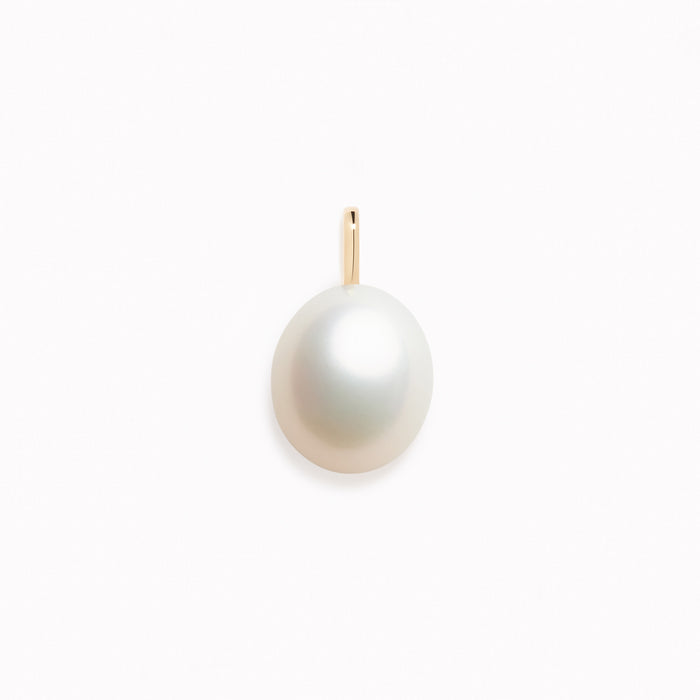 Pearl Charm 14k Gold featuring a single lustrous rice pearl pendant set in 14k yellow gold on a white background