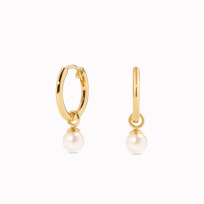 Freshwater pearl huggie earrings in gold vermeil