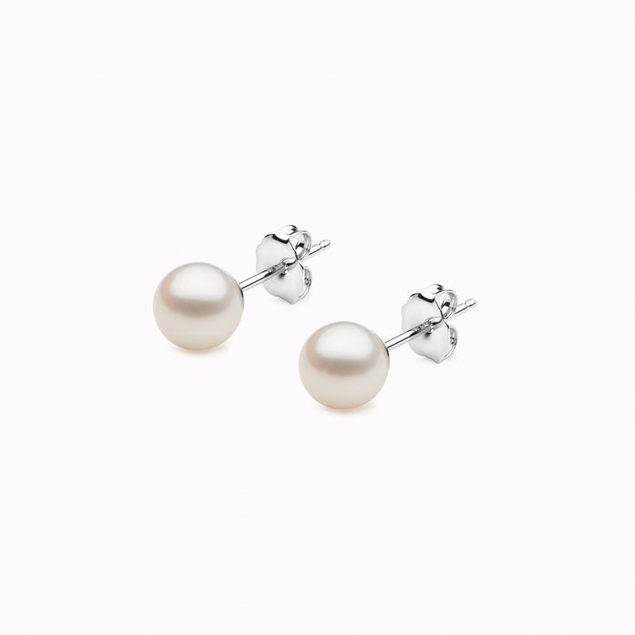 Round pearl stud earrings with butterfly backing in silver