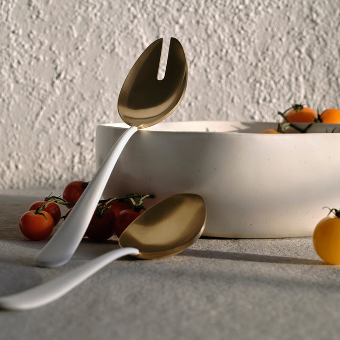 Serving spoons flatware by Fable Home, shown in a goldandwhite finish. – #goldandwhite