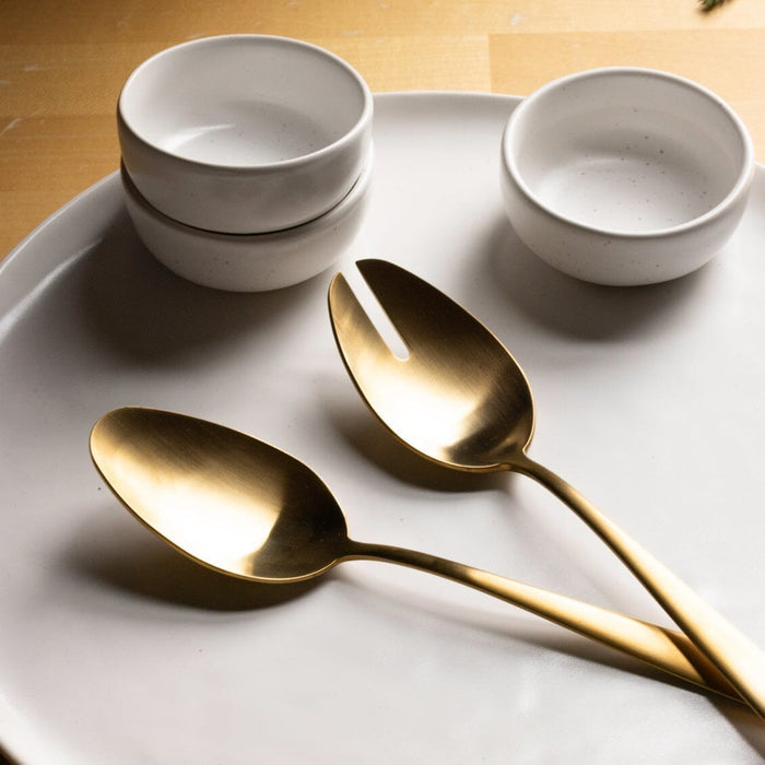 Serving spoons flatware by Fable Home, shown in a goldandwhite finish. – #goldandwhite