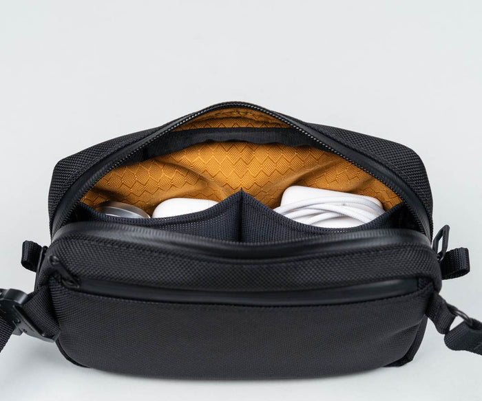 Two side pockets fit accessories