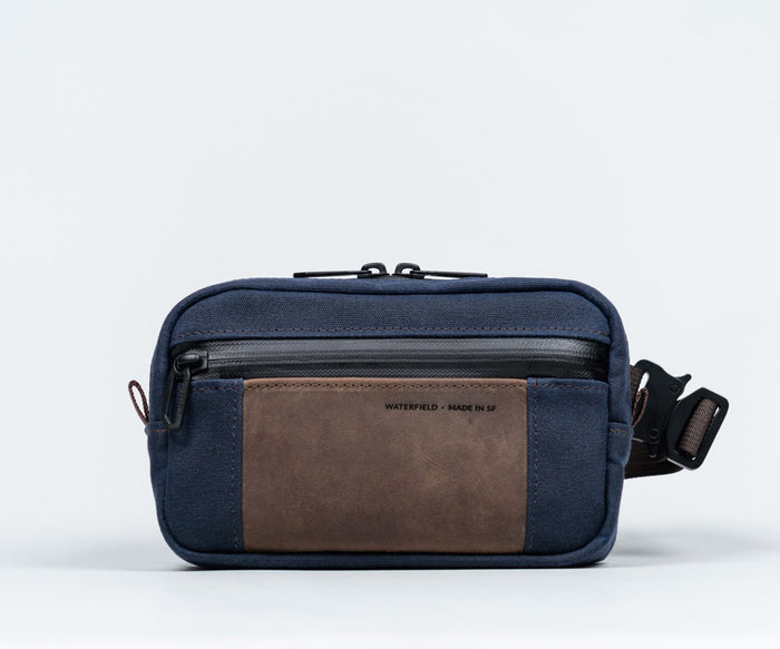 Waxed Canvas Navy + Chocolate Leather $129