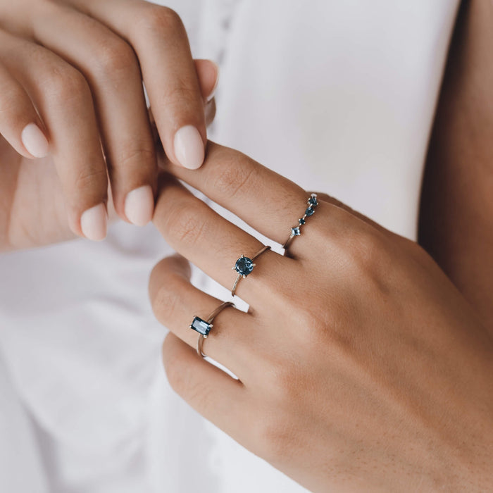 3 blue gemstone rings in sterling silver